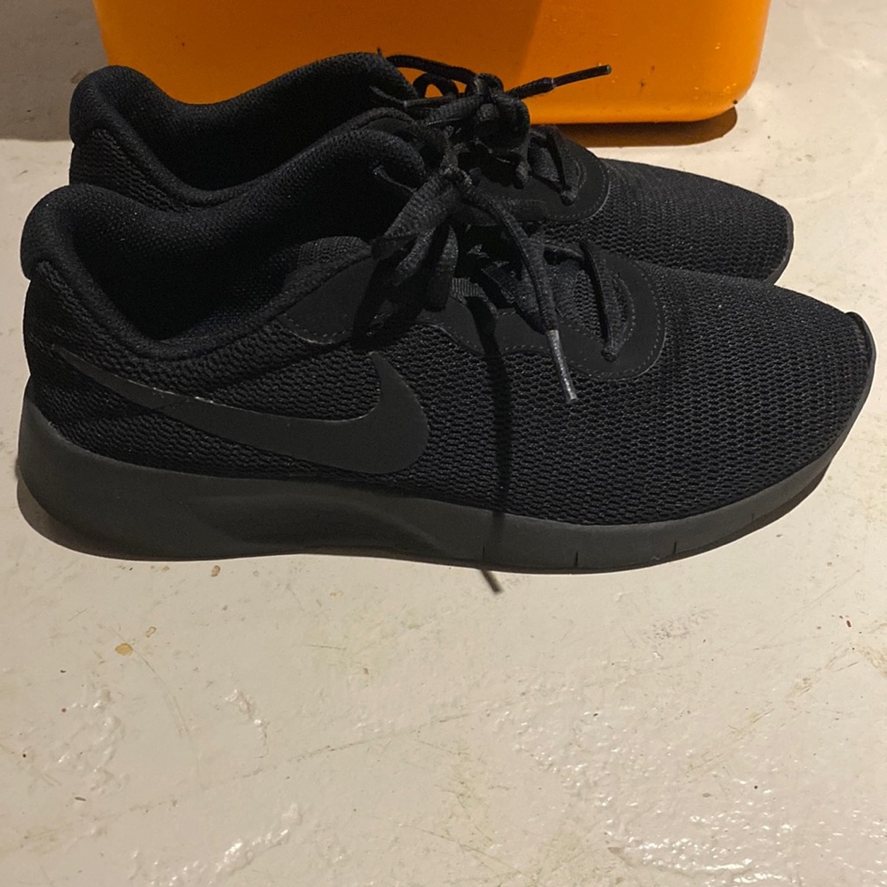 Boys black Nike sneakers